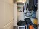 Organized walk-in closet offers shelving and storage for clothing and accessories at 35 E Agate Ave # 208, Las Vegas, NV 89123