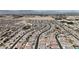 The aerial view showcases the tract home neighborhood amid desert landscape at 3964 E Marathon Dr, Pahrump, NV 89061