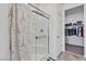 Bathroom featuring a glass-enclosed shower and a view into the closet at 3964 E Marathon Dr, Pahrump, NV 89061
