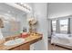 Bright bathroom with vanity sink, granite countertop, and ensuite bedroom view at 3964 E Marathon Dr, Pahrump, NV 89061