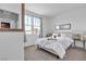 Bright bedroom featuring a comfortable bed, plush bedding, and natural light at 3964 E Marathon Dr, Pahrump, NV 89061