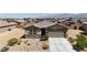 Charming single-story home with stone accents and desert landscaping offering great curb appeal at 3964 E Marathon Dr, Pahrump, NV 89061