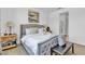 Main bedroom showcases an upholstered bed, bench seating, and neutral decor at 3964 E Marathon Dr, Pahrump, NV 89061