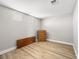 Bedroom with laminate flooring and two windows at 4563 Townwall St, Las Vegas, NV 89115