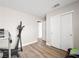 Inviting exercise room showcasing wood floors and closet space to support an active lifestyle at 4563 Townwall St, Las Vegas, NV 89115