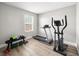 Bright workout space featuring exercise equipment and hardwood floors perfect for home fitness routines at 4563 Townwall St, Las Vegas, NV 89115