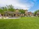 Community picnic areas featuring well-maintained lawns, mature trees, and covered picnic tables at 4563 Townwall St, Las Vegas, NV 89115