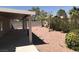Backyard with a covered patio and low-maintenance landscaping at 4704 Wild Oak Way, North Las Vegas, NV 89031