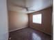 Bedroom featuring neutral walls, tiled floors, and a ceiling fan at 4704 Wild Oak Way, North Las Vegas, NV 89031