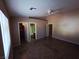 Bedroom featuring tile flooring, closet, and ensuite bathroom entrance at 4704 Wild Oak Way, North Las Vegas, NV 89031