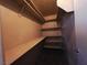 Spacious walk-in closet with ample shelving and tiled floors at 4704 Wild Oak Way, North Las Vegas, NV 89031
