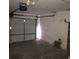 Spacious garage with an automatic door at 4704 Wild Oak Way, North Las Vegas, NV 89031