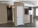 View into the kitchen with breakfast bar and white refrigerator at 4704 Wild Oak Way, North Las Vegas, NV 89031