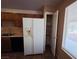 Functional kitchen features matching appliances, ample storage, and pantry at 4704 Wild Oak Way, North Las Vegas, NV 89031