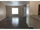 Neutral living room with tile flooring, and large window for natural light at 4704 Wild Oak Way, North Las Vegas, NV 89031