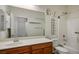 Bathroom featuring a single sink vanity, a toilet, and a shower-tub combination at 5235 E La Campana Dr, Pahrump, NV 89061