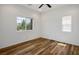 Bright bedroom features hardwood floors and great natural light at 5235 E La Campana Dr, Pahrump, NV 89061