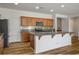 Spacious kitchen featuring a large island, stainless steel appliances, and granite countertops at 5235 E La Campana Dr, Pahrump, NV 89061