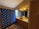 Bright bathroom featuring double sinks, vanity, shower and bath at 5517 Rock Creek Ln, Las Vegas, NV 89130