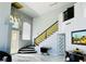 Grand foyer with high ceilings, marble floors, and a striking staircase at 5568 Yellow Ash St, Las Vegas, NV 89118