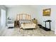 A main bedroom featuring a bed, rug, bench and a crib perfect for relaxation and Gathering time at 5568 Yellow Ash St, Las Vegas, NV 89118