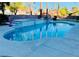 Sparkling pool and spa offer a relaxing outdoor oasis with lush landscaping at 5568 Yellow Ash St, Las Vegas, NV 89118