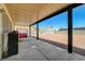 View of backyard featuring covered patio, rock landscaping, and storage shed at 5730 Coleman St, North Las Vegas, NV 89031