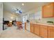 Open kitchen and living space showcasing a breakfast nook and ample natural light at 5730 Coleman St, North Las Vegas, NV 89031