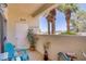 Private balcony offers a cozy seating area with views of the community landscaping at 698 S Racetrack Rd # 1714, Henderson, NV 89015