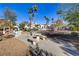 Common area featuring multiple tables, a grill, and well-maintained landscaping at 698 S Racetrack Rd # 1714, Henderson, NV 89015