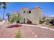 Charming two-story condo building with well-maintained landscaping and mature shade trees at 698 S Racetrack Rd # 1714, Henderson, NV 89015