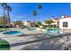 Community pool and spa area featuring waterfalls and ample space for relaxation at 698 S Racetrack Rd # 1714, Henderson, NV 89015