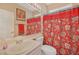 Bathroom featuring a single sink vanity, toilet, and a shower with a decorative curtain at 7821 Red Leaf Dr, Las Vegas, NV 89131