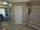 Bright bathroom boasts tiled floor, a white door, and glass enclosed shower stall at 7821 Red Leaf Dr, Las Vegas, NV 89131