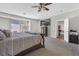 Bedroom showcasing bay window and plush carpet, perfect for relaxation at 7821 Red Leaf Dr, Las Vegas, NV 89131