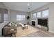 Inviting living room features a fireplace, recessed lighting, and a neutral color palette at 7836 Pinnochio Ave, Las Vegas, NV 89131