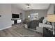 Serene main bedroom features a ceiling fan, television, and soft, neutral tones at 7836 Pinnochio Ave, Las Vegas, NV 89131