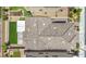 Aerial view of the beautiful home with a tile roof, well manicured yard, and outdoor living spaces at 8055 Tank Loop St, Las Vegas, NV 89166