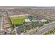 A community park with a pool, grassy field, and basketball courts in close proximity to homes at 8055 Tank Loop St, Las Vegas, NV 89166