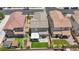 Aerial view showcases a home with outdoor space, turf, patio, and proximity to community amenities at 8055 Tank Loop St, Las Vegas, NV 89166