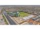 An aerial view of the community park, pool, and basketball courts near the community homes at 8055 Tank Loop St, Las Vegas, NV 89166
