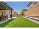 Expansive backyard lawn area perfect for outdoor activities and recreation at 8055 Tank Loop St, Las Vegas, NV 89166