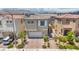 Charming two-story home with a well-manicured lawn, beautiful landscaping, and a two car garage at 8055 Tank Loop St, Las Vegas, NV 89166