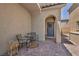 Close-up of the welcoming front porch area with an outdoor seating arrangement at 8055 Tank Loop St, Las Vegas, NV 89166