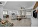 Bright and airy living room offering an open floor plan and seamless transition to the kitchen at 8055 Tank Loop St, Las Vegas, NV 89166
