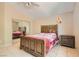 Bedroom with ceiling fan, closet, and a view of the backyard at 8242 Tribute Ln, Las Vegas, NV 89147
