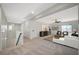 Open loft area with a neutral color scheme, ample seating, and modern décor at 8754 Moon Crater Ave, Las Vegas, NV 89178