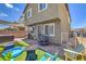 Entertaining backyard with covered patio, spa, grill, and outdoor seating, perfect for relaxing or socializing at 9208 S Park St, Las Vegas, NV 89178