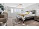 Bedroom featuring ample natural light and comfortable furnishings perfect for relaxation at 9208 S Park St, Las Vegas, NV 89178
