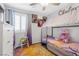 bedroom featuring a unique bed and cheerful decor, creating a playful and inviting space at 9208 S Park St, Las Vegas, NV 89178